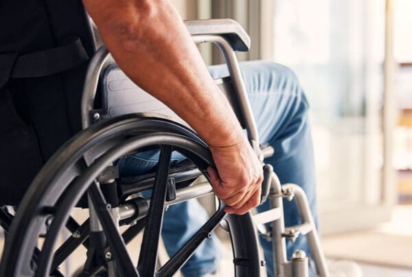 Disability and Your Finances - Man, Hands and Wheelchair for Support, Hope or Travel in Healthcare or Medicare at Home