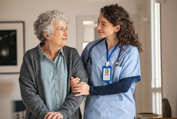 What to Look for in an Extended-Care Policy - Caregiver Assist Senior Woman at Home