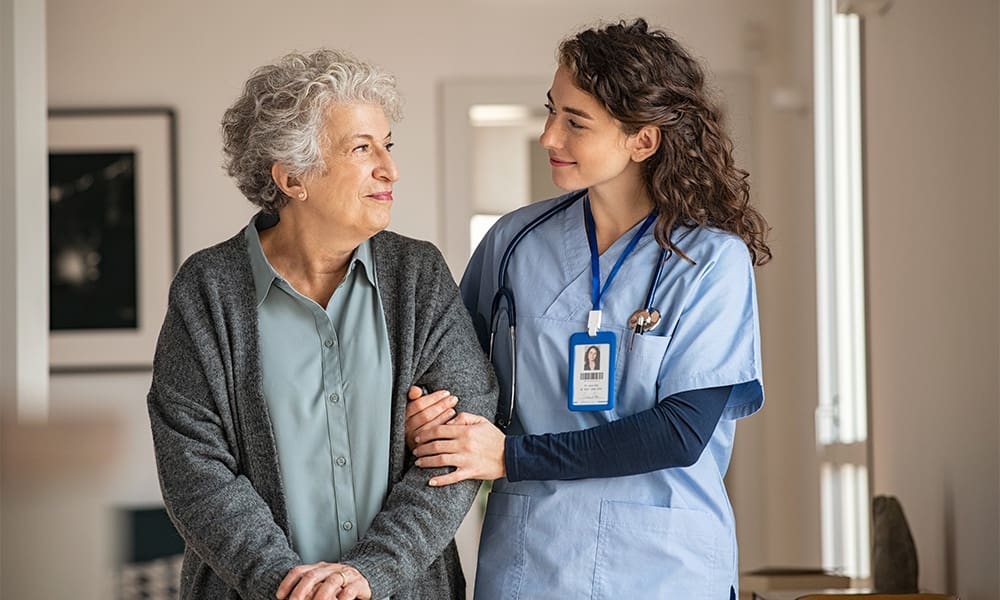 What to Look for in an Extended-Care Policy - Caregiver Assist Senior Woman at Home